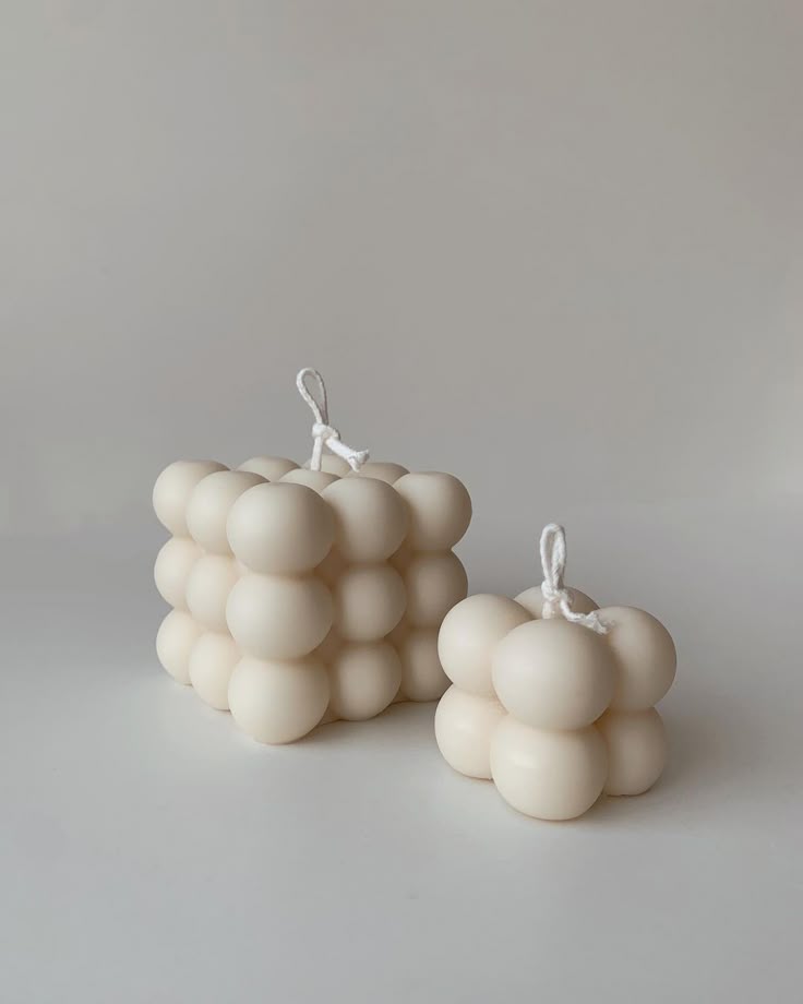 Handcrafted ivory bubble cube soy wax candles with cotton wicks, modern minimalist decorative candles for home décor and gifting.